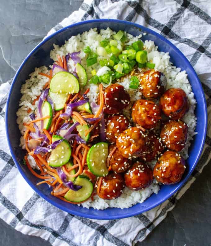 bowl of teriyaki chicken meatballs and rice with veggies