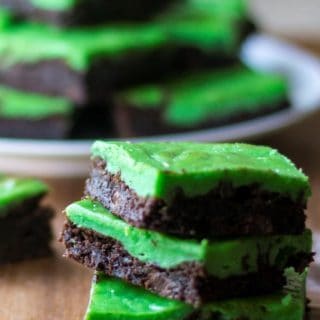 Green Cheesecake Brownie Bars stacked up three high