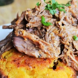 Jerk Pulled Pork with Sweet Corn Cakes | Tender Jerk Pulled Pork paired with Sweet Corn Cakes is the perfect combination of sweetness and spicy heat that definitely makes this the perfect meal. | Pack Momma | https://www.awickedwhisk.com