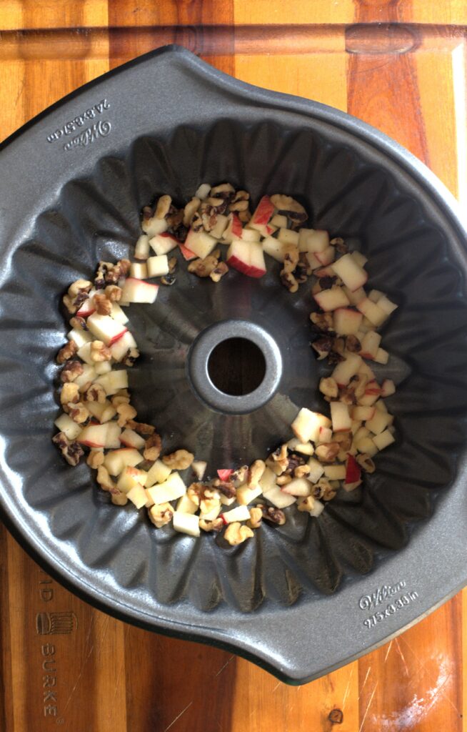 Diced apples in a bundt pan