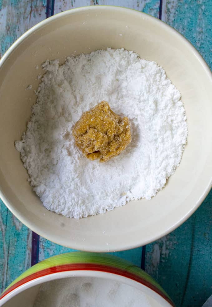 pumpkin cookie dough ball to be rolled in sugar
