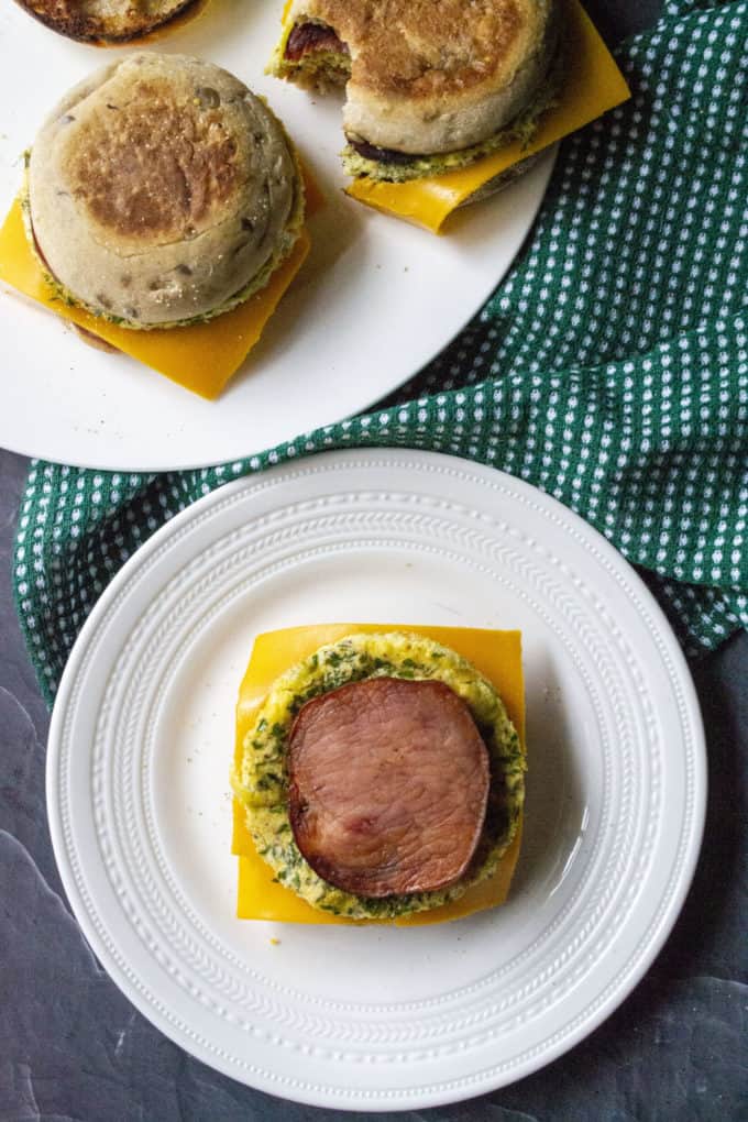 building breakfast sandwiches on a plate