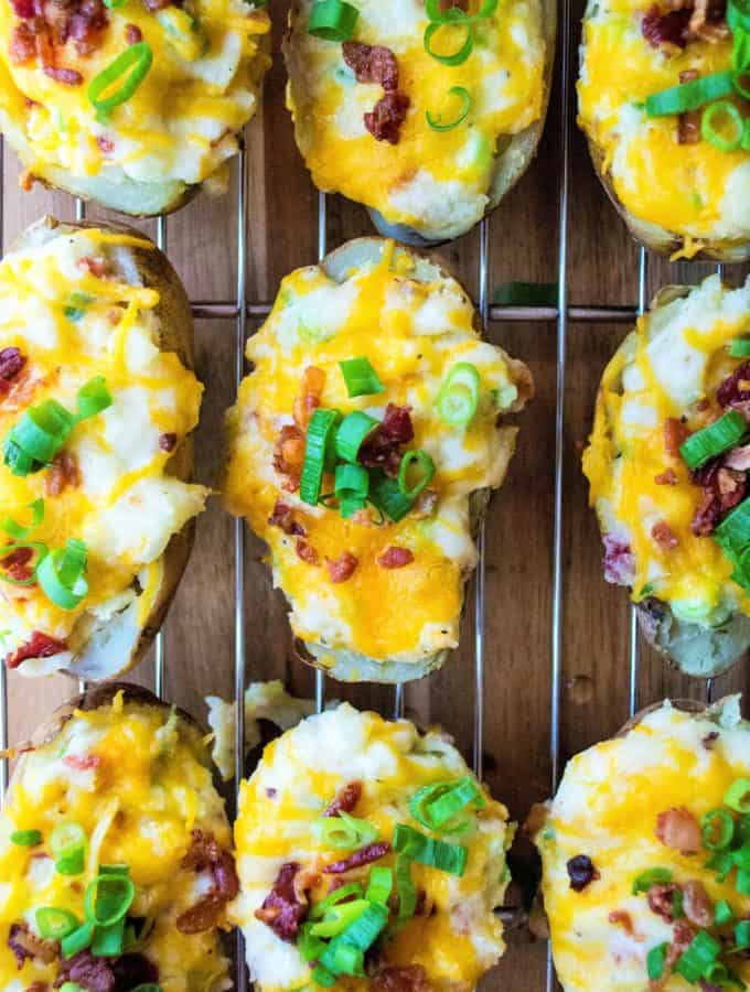 Quick Twice Baked Potatoes are super creamy, loaded up with cheese, bacon and green onions and are ready to eat in just 30 minutes. 