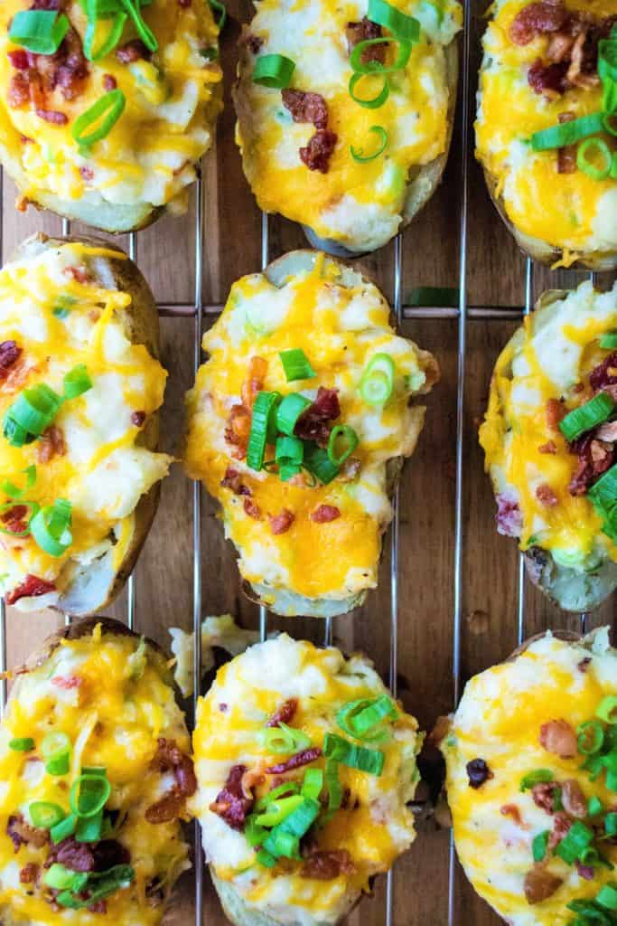 Quick Twice Baked Potatoes are crispy potato skins loaded up with a creamy potato filling of cheese, bacon and green onions and are ready to eat in just 30 minutes. 