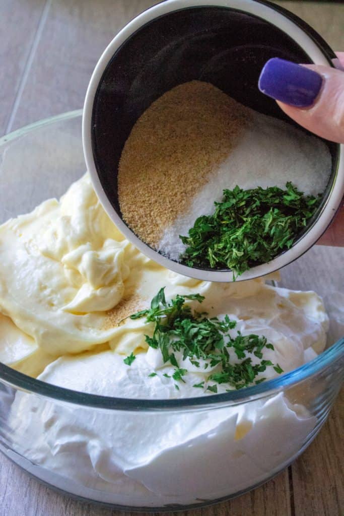 Homemade Ranch Veggie Dip is tangy, packed with tons flavor and the easiest veggie dip to make from scratch in just 5 minutes. Loaded with herbs, spices and a few ingredients you probably already have on hand, this Homemade Ranch Veggie Dip is perfect for snacking on fresh vegetables, dipping your favorite chicken wings or dunkin' your french fries! | A Wicked Whisk