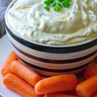 Homemade Ranch Veggie Dip is tangy, packed with tons flavor and the easiest veggie dip to make from scratch in just 5 minutes. Loaded with herbs, spices and a few ingredients you probably already have on hand, this Homemade Ranch Veggie Dip is perfect for snacking on fresh vegetables, dipping your favorite chicken wings or dunkin' your french fries! | A Wicked Whisk