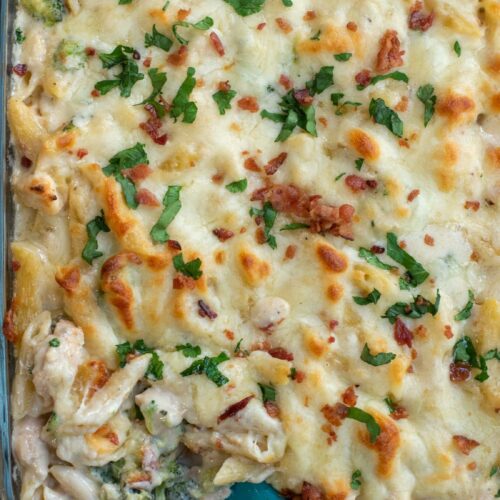 This baked Chicken Broccoli Alfredo Pasta is a hearty upgrade on your favorite fettuccini Alfredo recipe. Made with shredded chicken, crispy bacon, broccoli, homemade Alfredo sauce and tons of cheese, this cheesy chicken Alfredo casserole is an ultimate comfort food favorite!