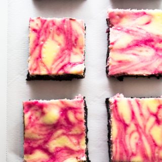 Blackberry Lemon Cheesecake Bars - Blackberry Lemon Cheesecake Bars are the perfect sweet treat that won't weigh you down. Tart, creamy and decadent, these are easy and delicious every time. | Pack Momma | https://www.awickedwhisk.com