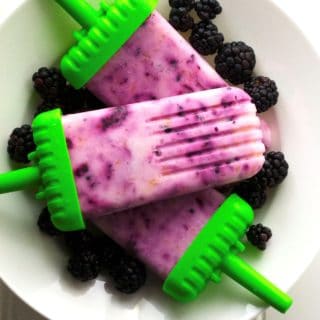 Blackberry Peach Yogurt Popsicle | This Blackberry Peach Yogurt Popsicle is the perfect sweet treat to celebrate the warmer weather. With only three ingredients, it gets no easier than this! | Pack Momma | https://www.awickedwhisk.com