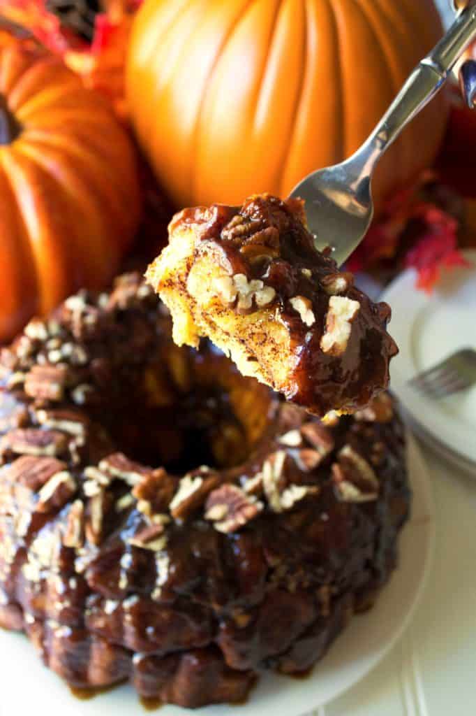 Pumpkin Monkey Bread with Salted Caramel Glaze | Pumpkin Monkey Bread with Salted Caramel Glaze is the perfect celebration of pumpkin, sweetness and spice to warm up your morning. | Pack Momma | https://www.awickedwhisk.com