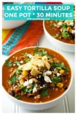 Easy Tortilla Soup is the perfect bowl of spicy comfort food to serve up to your family and friends. Bursting with tender chicken, corn, beans and all of your favorite Mexican flavors, this Easy Tortilla Soup is the ultimate ONE POT 30 minute meal. | A Wicked Whisk | https://www.awickedwhisk.com #tortillasoup #easysouprecipe #chickentortillasoup #mexicansoup #mexicantortillasoup #30minutemeal #onepotmeal