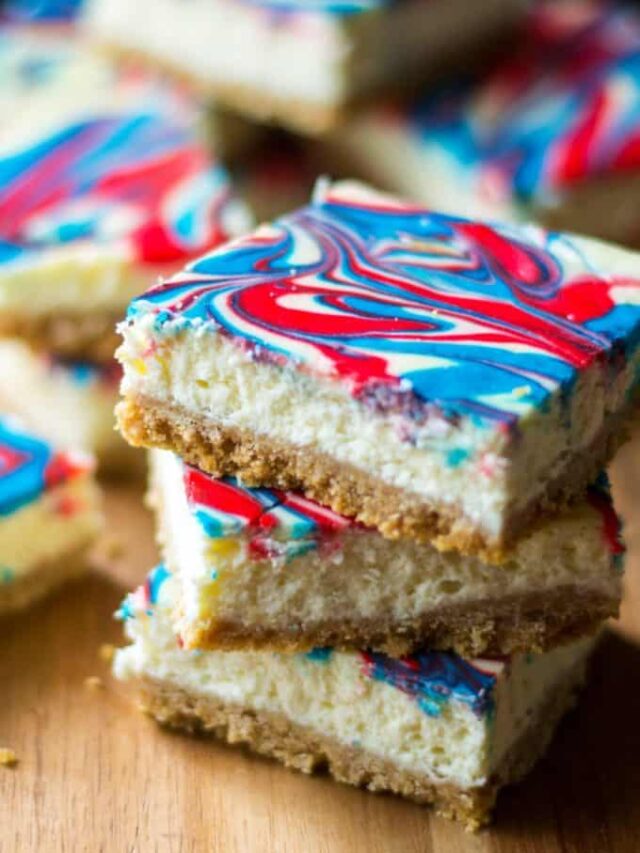 Red White and Blue Cheesecake Bars stacked up