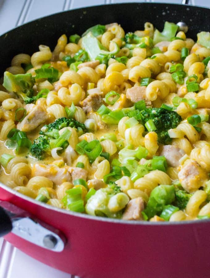 One Pot Cheesy Chicken Pasta | One Pot Cheesy Chicken Pasta is a hearty meal that's on your table in 30 minutes. Tender chicken, pasta, cheese and broccoli make this the perfect dinner. | Pack Momma | https://www.awickedwhisk.com
