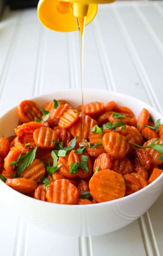 Spicy Honey Glazed Carrots | Spicy Honey Glazed Carrots are sweet with just a hint of spicy and they make the perfect accompaniment to any meal. Talk about the perfect side dish! | Pack Momma | https://www.awickedwhisk.com