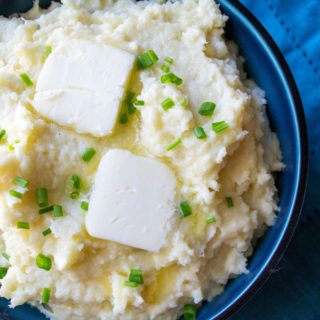 Garlic Parmesan Mashed Parsnips | Garlic Parmesan Mashed Parsnips are easy, creamy and flavored with garlic, butter and Parmesan cheese. These are the perfect versatile side dish to compliment any meal. | Pack Momma | https://www.awickedwhisk.com