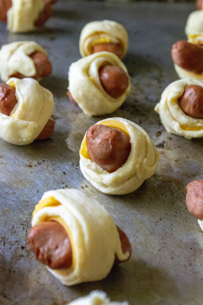 mini pigs in a blanket on a pan
