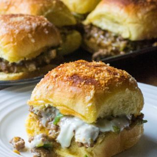 Philly Cheesesteak Sloppy Joe Sliders on a white plates