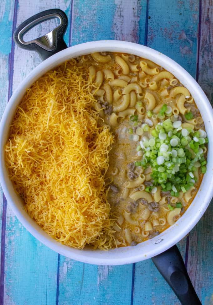 shredded cheese and green onions to be added to cheeseburger helper