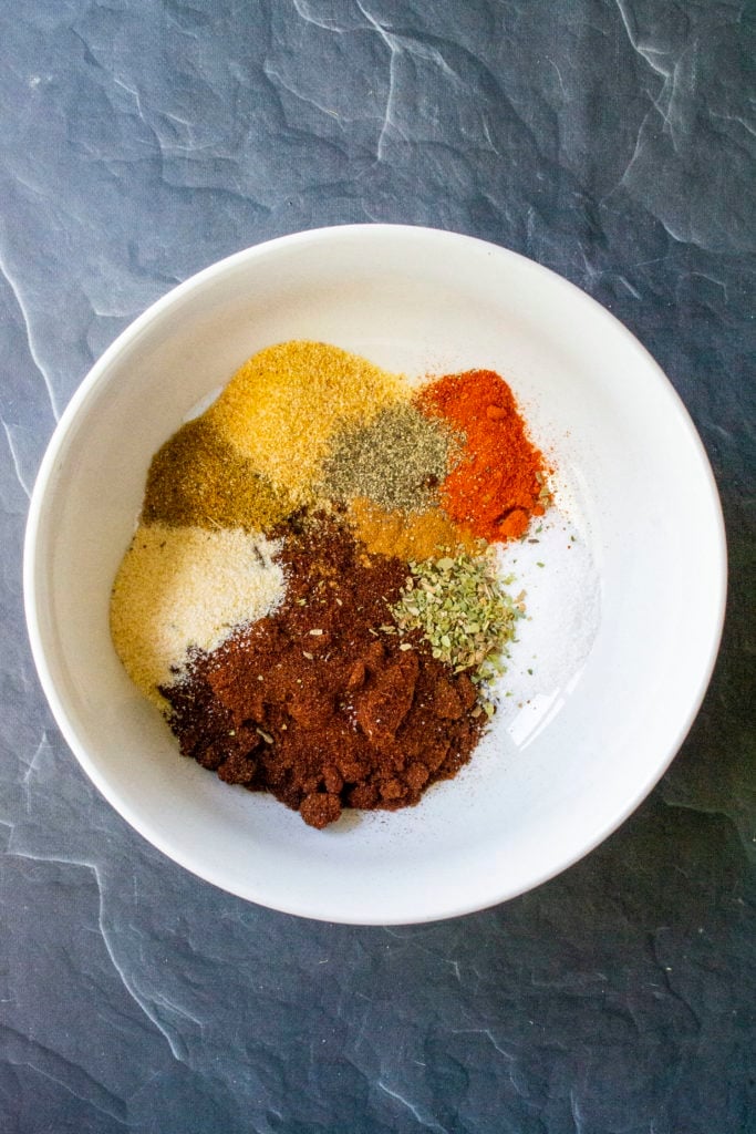 spices for red sauce in bowl
