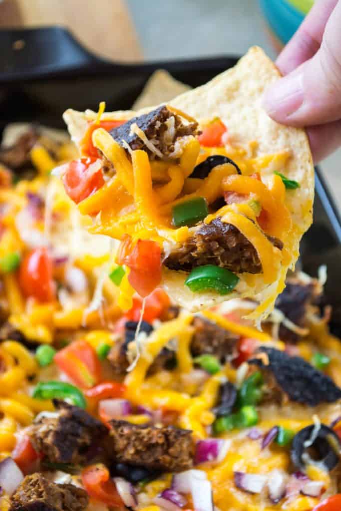 Take your tailgating fun to the next level with these Grilled Fully Loaded Veggie Nachos. Made with MorningStar Farms® Meat Lovers Burgers, these Grilled Fully Loaded Veggie Nachos are loaded up with your favorite toppings and are the perfect meatless vegan snack.