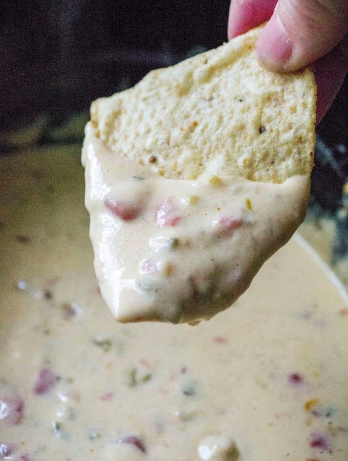 Whether you call it white cheese dip, queso dip or Queso Blanco Dip, this easy slow cooker cheese dip is the perfect party appetizer! Homemade Queso Blanco Dip is easy to make and the perfect slow cooker appetizer to serve up at any party or get-together.