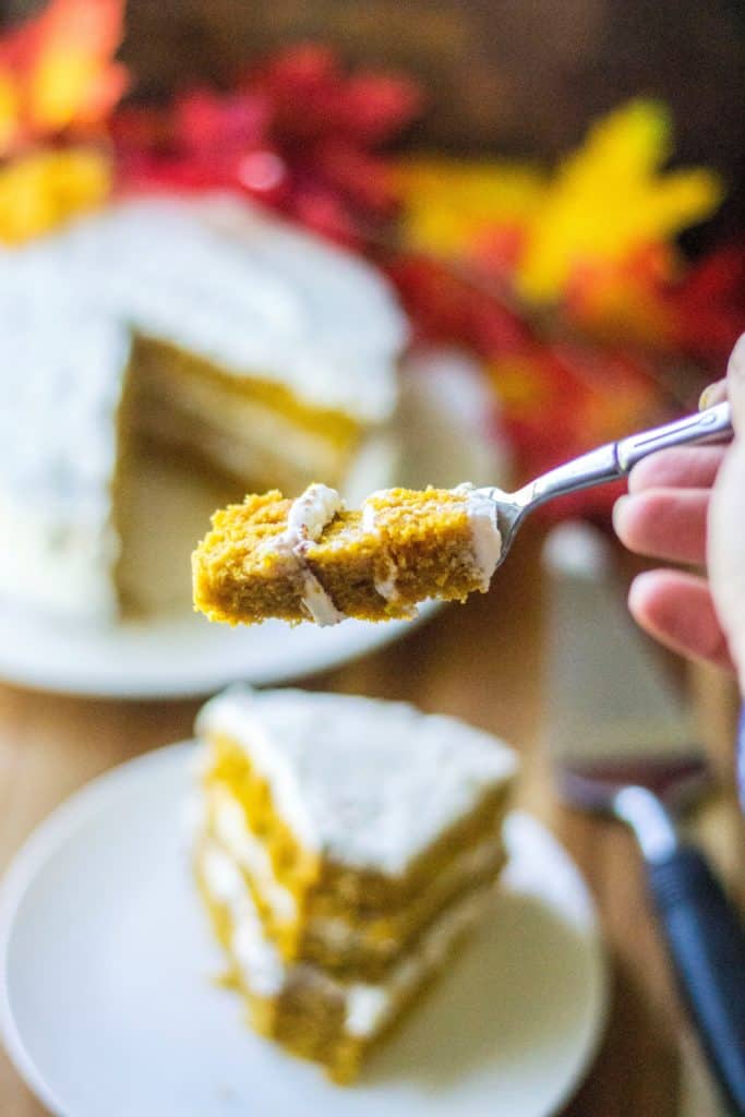 Pumpkin Spice Cake with Cream Cheese Frosting bite on a fork