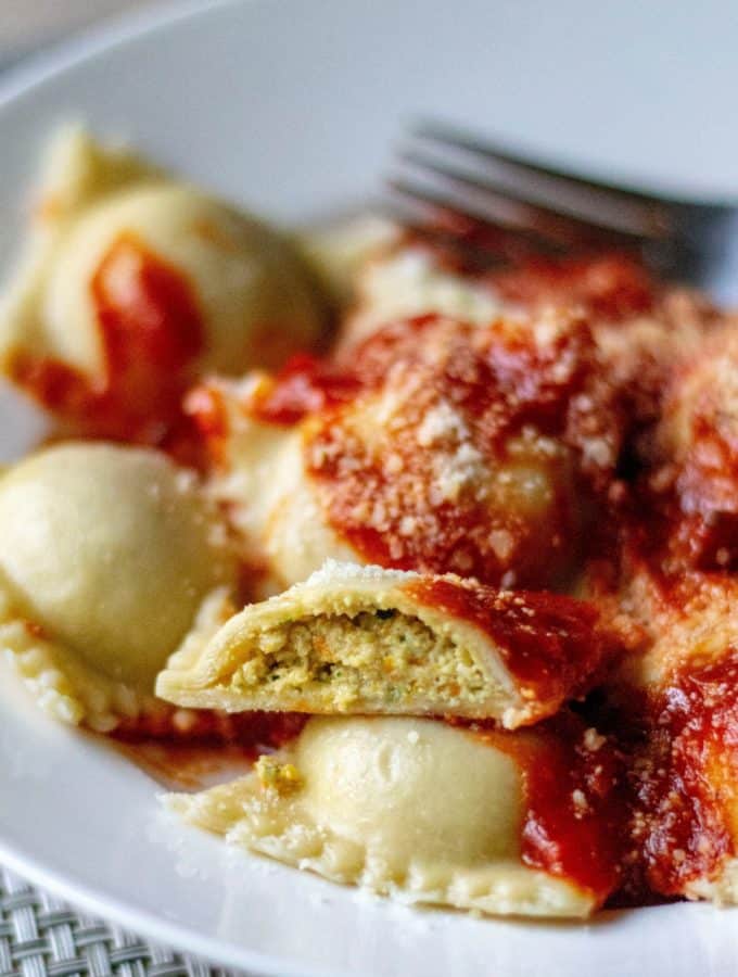 This Homemade Chicken Ravioli Recipe is an easy ravioli recipe made with ground chicken, a few simple pantry ingredients and tons of fresh produce. Easier to make than you might think, this Homemade Chicken Ravioli Recipe is the perfect chicken dinner to serve up this week.