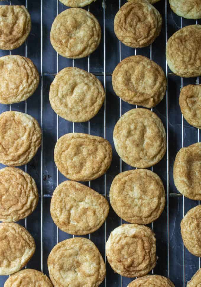 snickerdoodle cookies on a cooling rack
