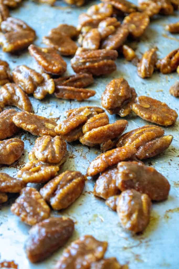 Cinnamon Sugar Candied Pecans on a pan