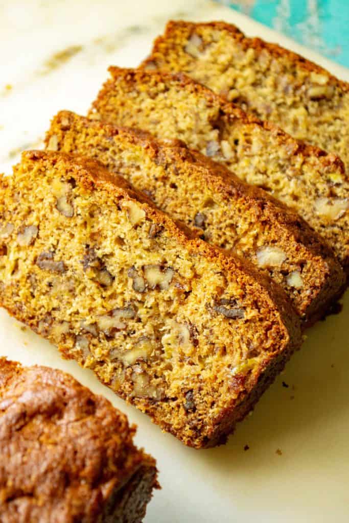Banana Walnut Bread is the ultimate super moist banana bread made with tons of crunchy walnuts. Made with over-ripe bananas and brown sugar, this Banana Walnut Bread is the perfect old fashioned homemade banana bread recipe.