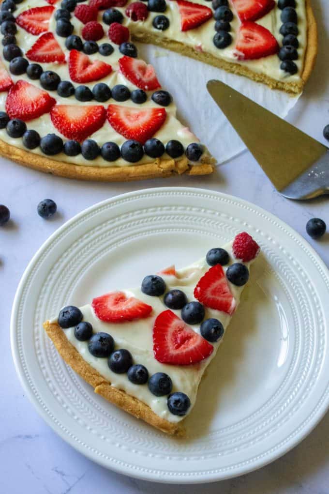 Fourth of July Fruit Pizza served up on plate