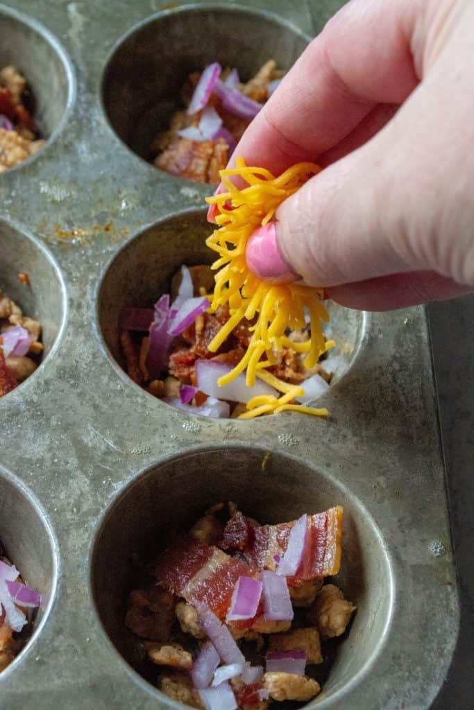 Keto Bacon Egg Muffins ingredients in a muffin tin