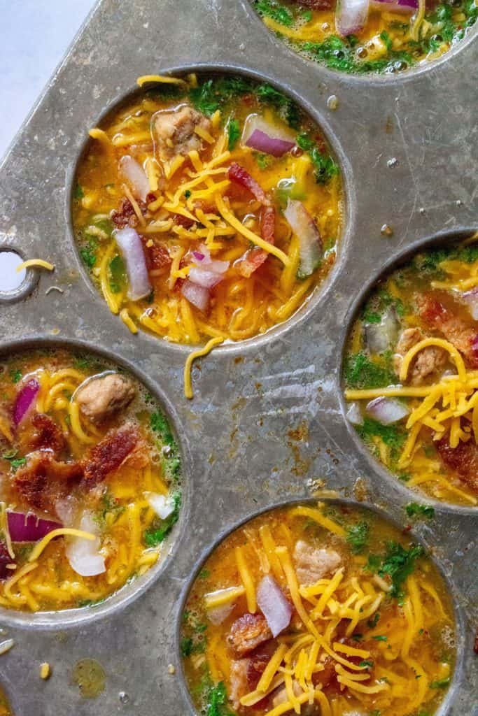 Keto Bacon Egg Muffins in a muffin tin