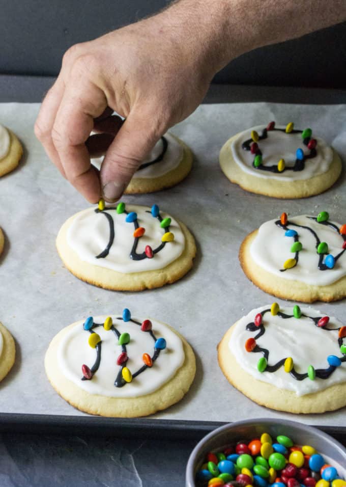 placing mnms on christmas cookies