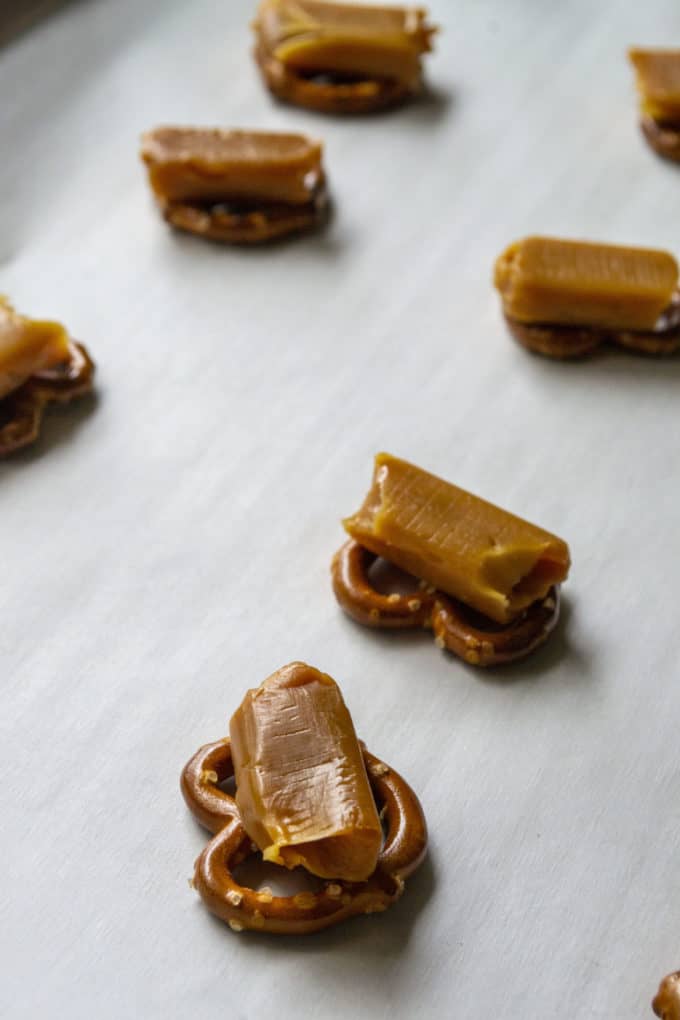 pretzels covered with soft caramel for homemade turtles