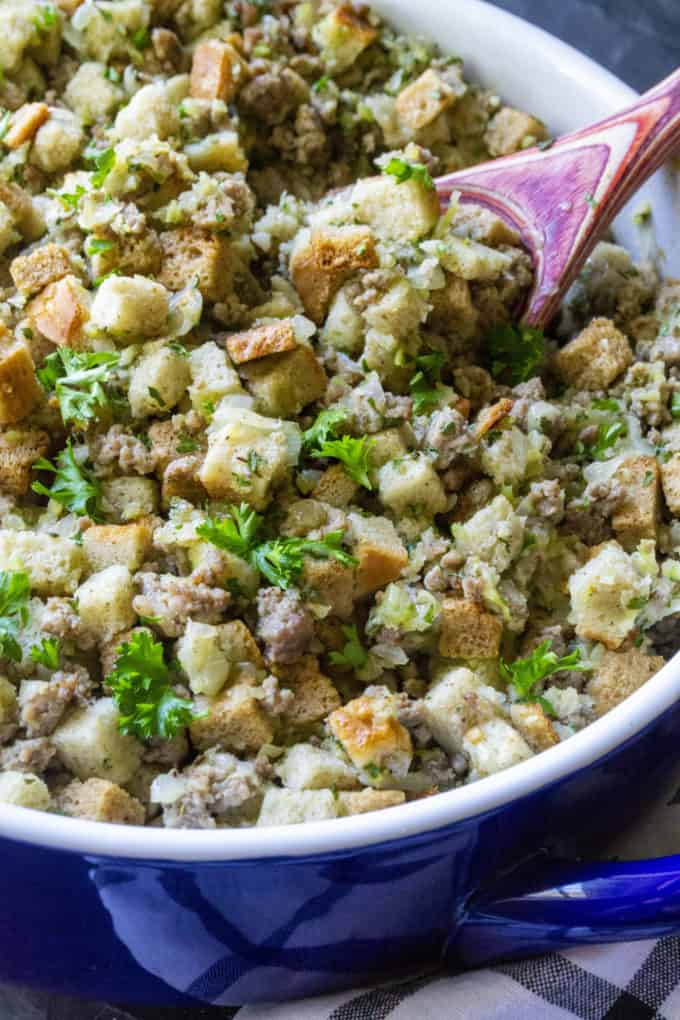 Traditional Sausage and Herb Stuffing on a serving spoon