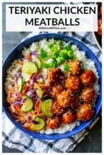 Juicy, tender oven baked chicken meatballs tossed in a super easy, sweet and spicy homemade teriyaki sauce! The perfect easy dinner recipe, serve these teriyaki meatballs up with rice and vegetables or toss them in your slow cooker for the ultimate party appetizer. #teriyakichickenmeatballs #teriyakichickenmeatballsdinner #teriyakichickenmeatballsbaked #teriyakichickenmeatballseasy #teriyakimeatballsandrice #chickenmeatballs #chickenteriyakimeatballs #teriyakimeatballseasy