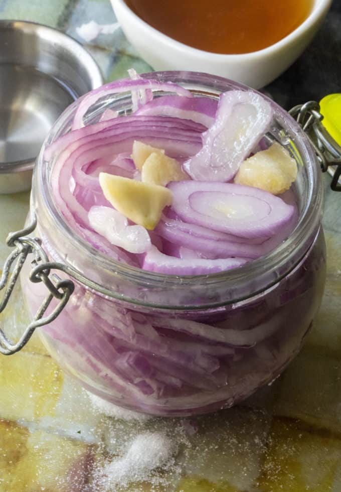 jar of sliced red onions and garlic