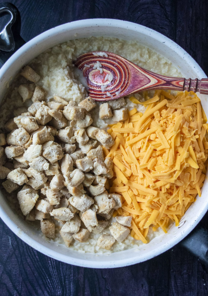 chicken rice and cheese in a skillet