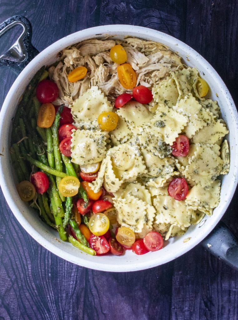 pan of ravioli chicken and veggies