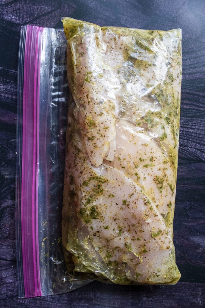 chicken marinating in a bag