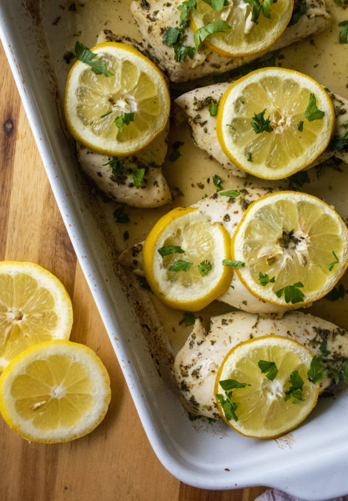 baked lemon chicken in a baking pan