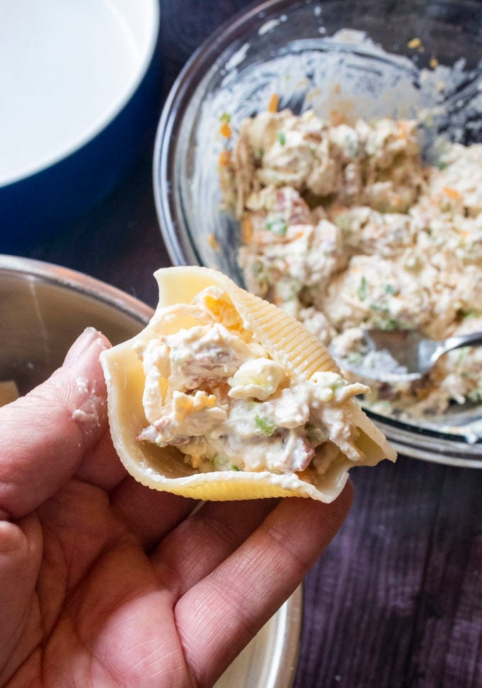 stuffing pasta shells with filling