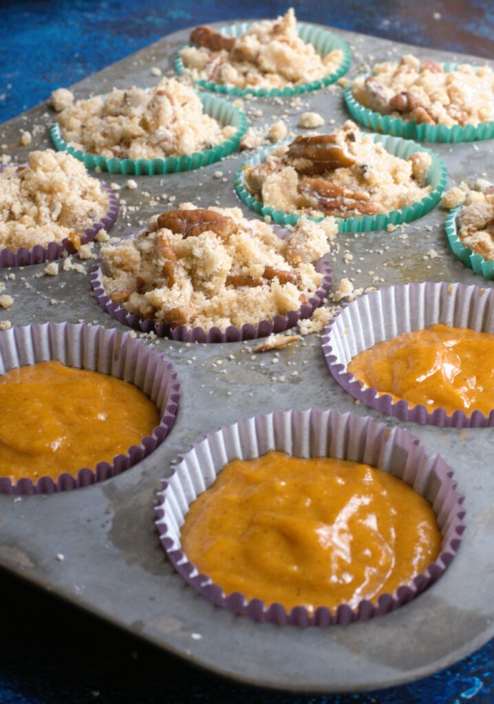 pumpkin muffins in a baking tin