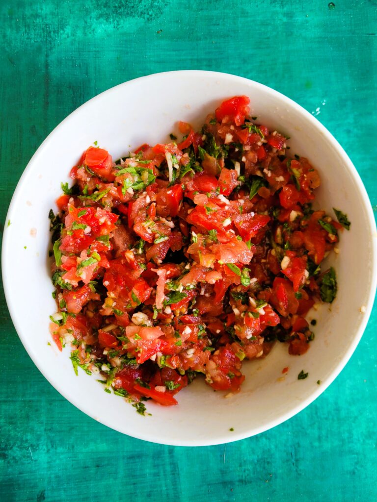 bowl of tomato, basil and garlic for bruschetta