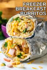 These easy Freezer Breakfast Burritos make breakfast meal prep a snap! Made with fluffy scrambled eggs, shredded cheese, Canadian bacon and crispy tater tots, these make ahead breakfast burritos are the perfect breakfast freezer meal to start your day.