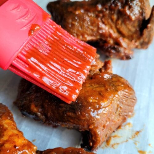 These Boneless Country-Style Pork Ribs in the Oven are tender, juicy, and packed with flavor. Baked low and slow and slathered in BBQ sauce, this easy recipe brings the smoky taste of BBQ indoors, no grill required!