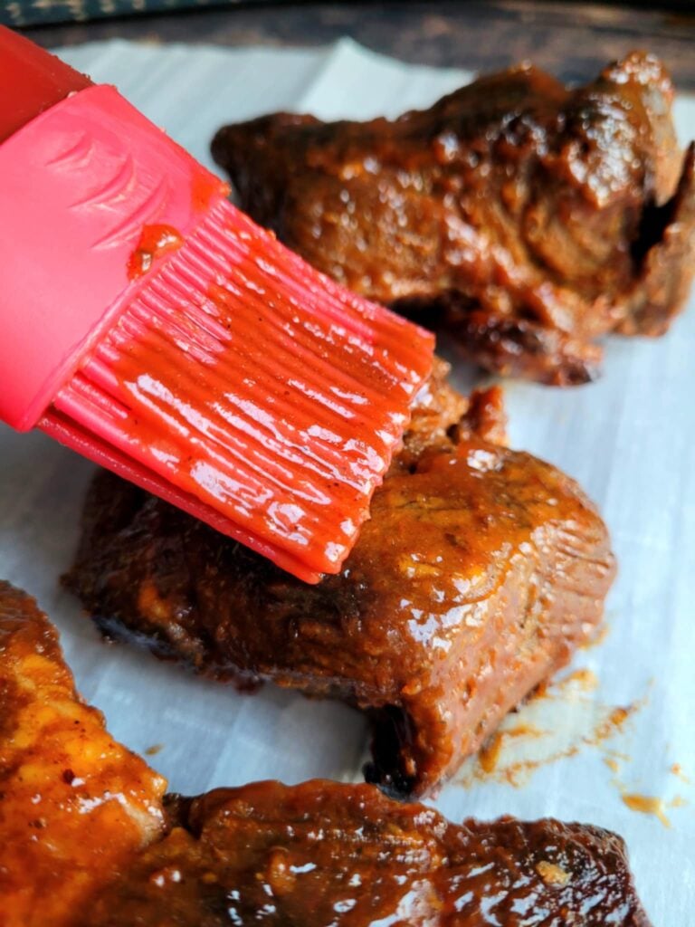 These Boneless Country-Style Pork Ribs in the Oven are tender, juicy, and packed with flavor. Baked low and slow and slathered in BBQ sauce, this easy recipe brings the smoky taste of BBQ indoors, no grill required!