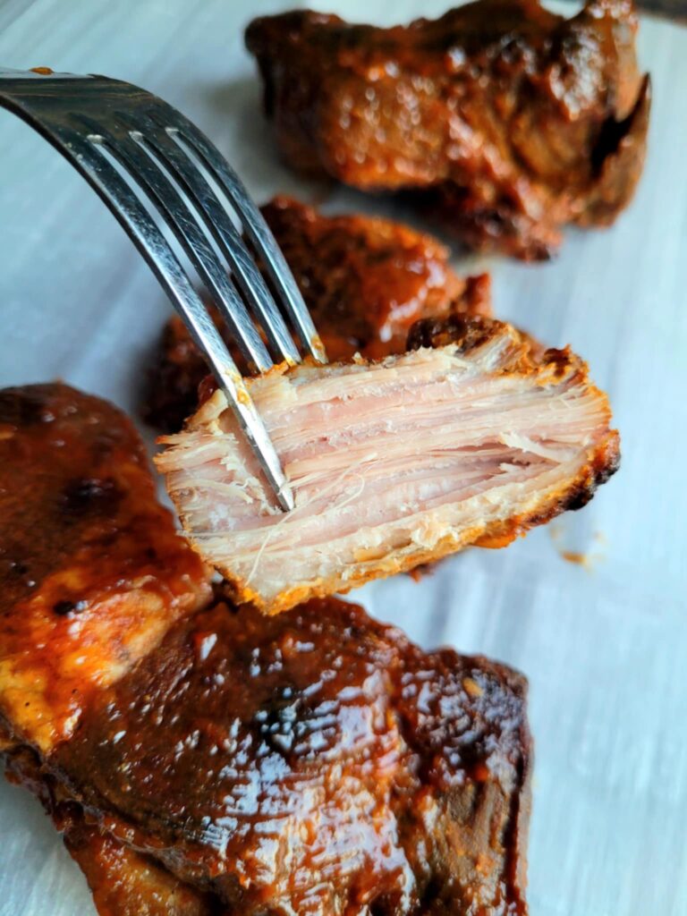 tender rib meat on a fork