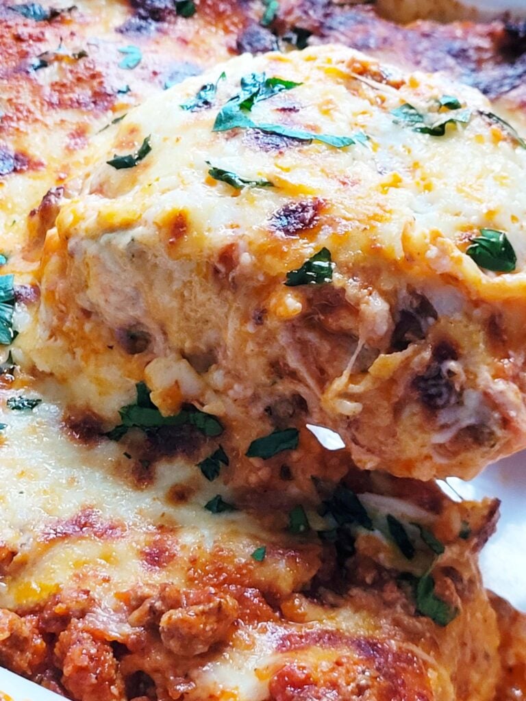 cheesy homemade lasagna on a spatula